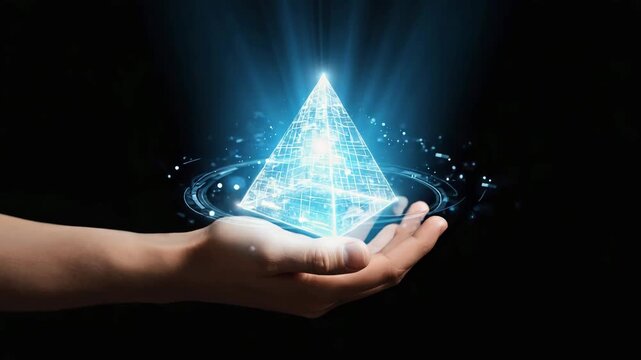 A hand holds a glowing, blue digital pyramid hologram with rotating data rings, representing advanced future technology and innovation, 4K video.