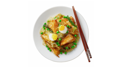 Delicious asian-style noodle dish featuring crispy fish fillets, green peas, and egg halves