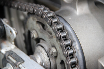 Gears and chains are part of a motorcycle's wheel drive system