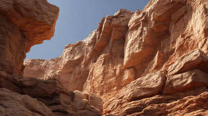 A stunning view of rocky cliffs under a clear blue sky, showcasing the natural beauty and geological formations of the landscape.
