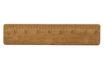 Wooden ruler displaying inch and metric measurements, isolated