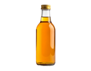 A clear glass bottle filled with golden amber liquid possibly whiskey or brandy with a golden cap isolated on a white background.