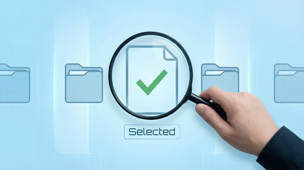 A hand is using a magnifying glass to focus on a file with a checkmark within a series of folders signifying selection and verification