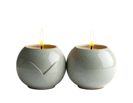 Two spherical, speckled holders glow with warm, flickering flames - Powered by Adobe