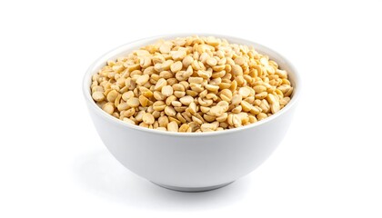 Fototapeta premium A white bowl overflows with a pile of golden-yellow split lentils. The image is brightly lit against a pure white background
