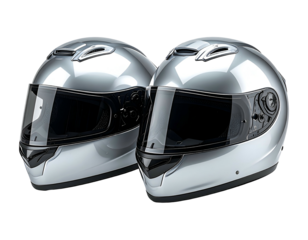 Two sleek silver full-face helmets with dark visors