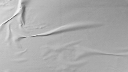 Glued paper texture. Crumpled and wrinkled surface of plain black paper poster background. Wrinkled wet paper