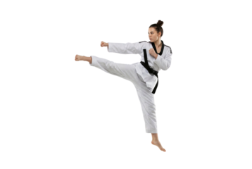 Young Woman Performing Taekwondo Kick in White Uniform with Black Belt
