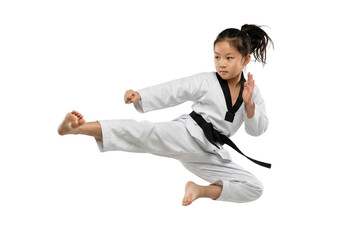 Dynamic Young Asian Girl in Taekwondo Uniform Performing Jump Kick