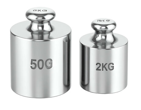 Two polished metal cylinders, one labeled 50g, the other 2kg