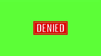"Denied Stamp Animation isolated on green backgroud. Denied rubber stamp mark with red ink on green Background. 4k video.