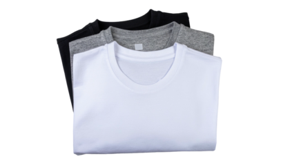 Stacked, folded black, gray, white t-shirts, top view