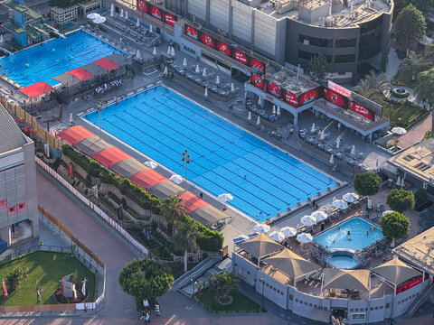 Cairo, Egypt - September 29, 2025: Aerial view of Al Ahly Club swimming pool complex on Zamalek Island