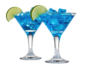 Two blue drinks in martini glasses with lime garnish