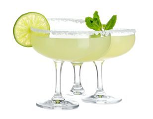 Two refreshing, pale green cocktails with salt rims and garnish