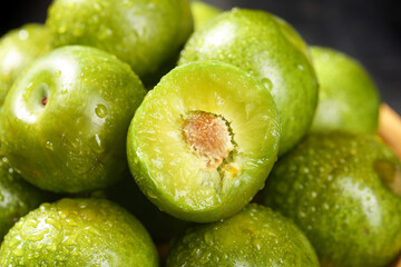 Fresh Green Sichuan Peppercorns with Water Droplets