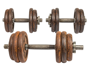 Two pairs of old, rusty, adjustable dumbbells with metal plates