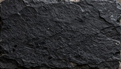 Closeup of Textured Black Slate Rock Surface with Natural Patterns and Smooth Finish
