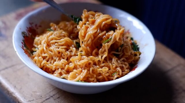 a bowl of fried noodles