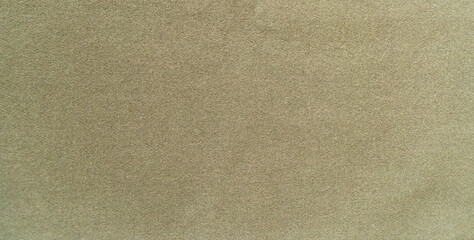 Photo of the texture of a green military drape.Military background for the text.Green cloth.