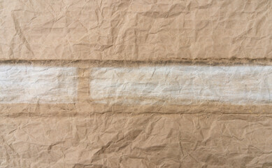 The texture of crumpled yellow craft paper.Craft background for the text.