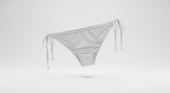 Clean White String Bikini Bottom Gracefully Floating Against a Light Studio Backdrop