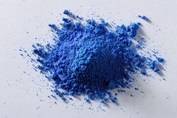 Heap of Shiny Electric Blue Powder on Textured White Background with Subtle Lighting for Beauty or Art Projects