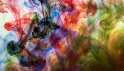 Colorful ink spreads in the water, forming artistic abstract patterns with stunning blobs of red, blue, and green. ai