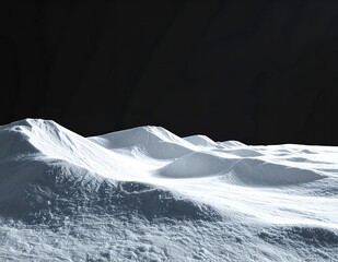 Snowy mountain landscape with dark sky, a serene and cold winter scene.