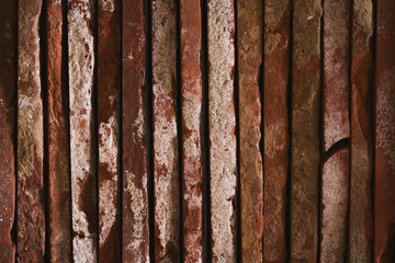closeup stacked old brick cut tiles