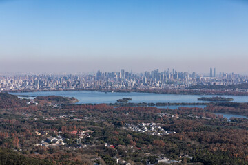 Fototapeta premium Hangzhou Skyline View from North Peak - Distant City Landscape
