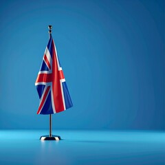 United Kingdom Flag on a Stand Against a Blue Background.