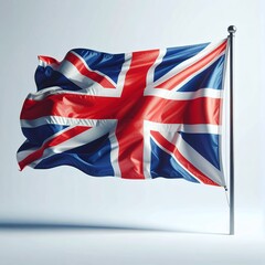 Union Jack Flag Waving Proudly on a Pole Against a Clean White Background.