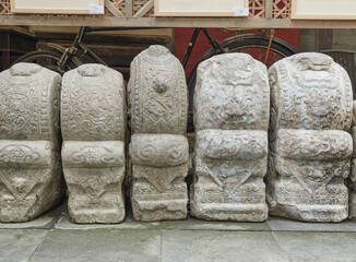 Row of Ornamental Stone Carvings Displayed Beautifully