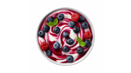 A bowl of yogurt topped with a mix of blueberries and raspberries, swirled with a berry sauce and garnished with fresh mint