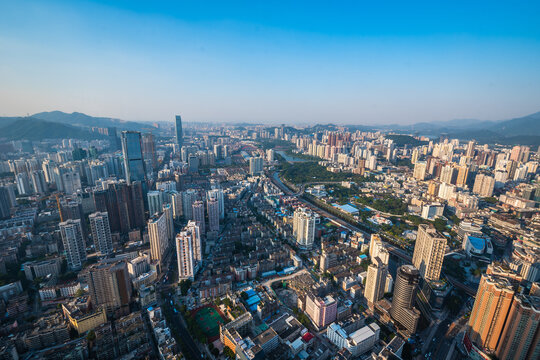 Shenzhen City Aerial Skyline with Mountains and River View