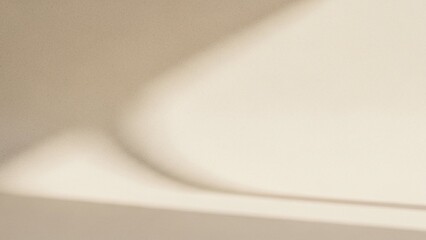 Abstract Soft Curves and Shadows on Beige Plaster Backgroun