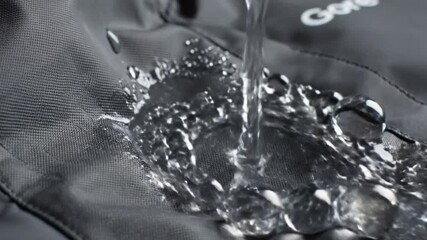 Waterproofing test outdoor setting product demonstration high-resolution close-up material durability