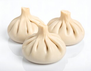 Three dumpling-like food items, white background, soft lighting