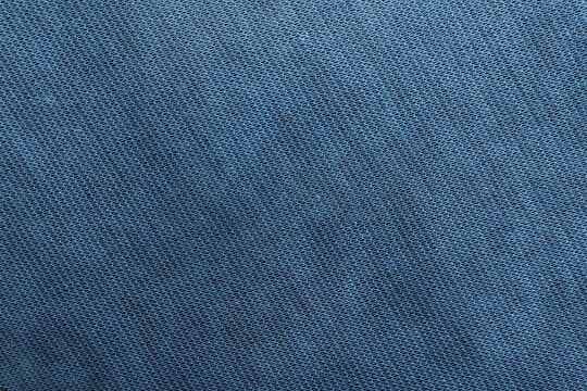 Seamless blue micro mesh fabric texture background for sportswear, industrial textile, or technical apparel design.