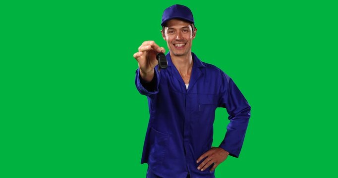 Caucasian man wearing blue overall on green background