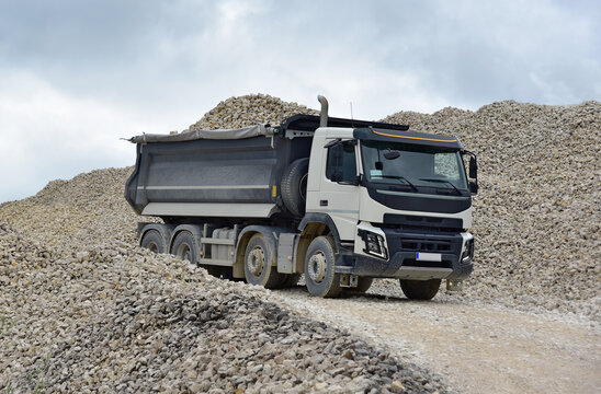 A large dump truck in operation at a quarry