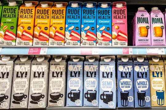 Selection Of Supermarket Cartons Of Oat Drinks And Dairy Alternatives