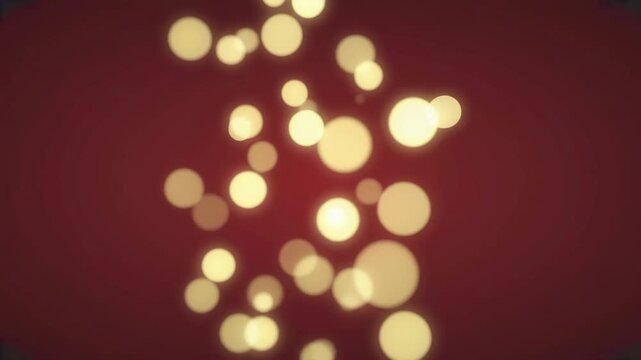 Goldene Bokeh-Lichtpunkte auf rotem festlichem Hintergrund