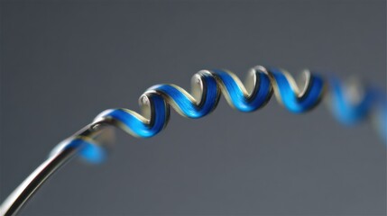 Medium shot of a flexible bimetallic strip bending smoothly in a thermostatic mechanism illustrating its adaptability and dynamic response to temperature changes