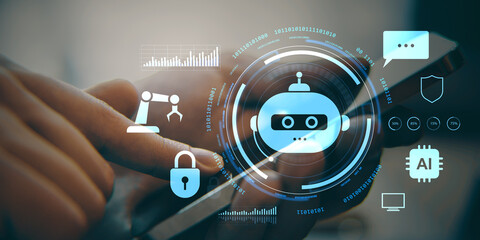 Chatbot and artificial intelligence interface with futuristic technology icons on a digital screen over a smartphone in user’s hand.