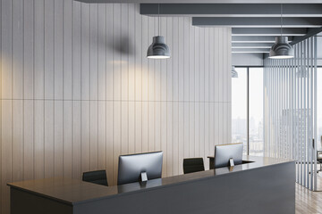 Modern empty corporate reception area with sleek desk, computers, and wood panel wall in bright workspace interior for branding mockup template. 3D Rendering