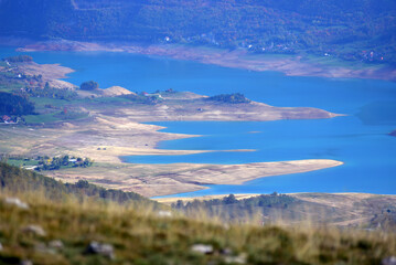The shore of the dried-up lake with layers of sediment