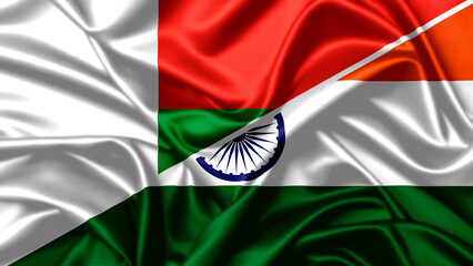 Silk waving flags of India and Madagascar showing friendship and diplomatic cooperation between nations