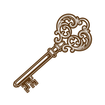 Vintage ornate antique skeleton key with intricate designs and swirls on handle and bow